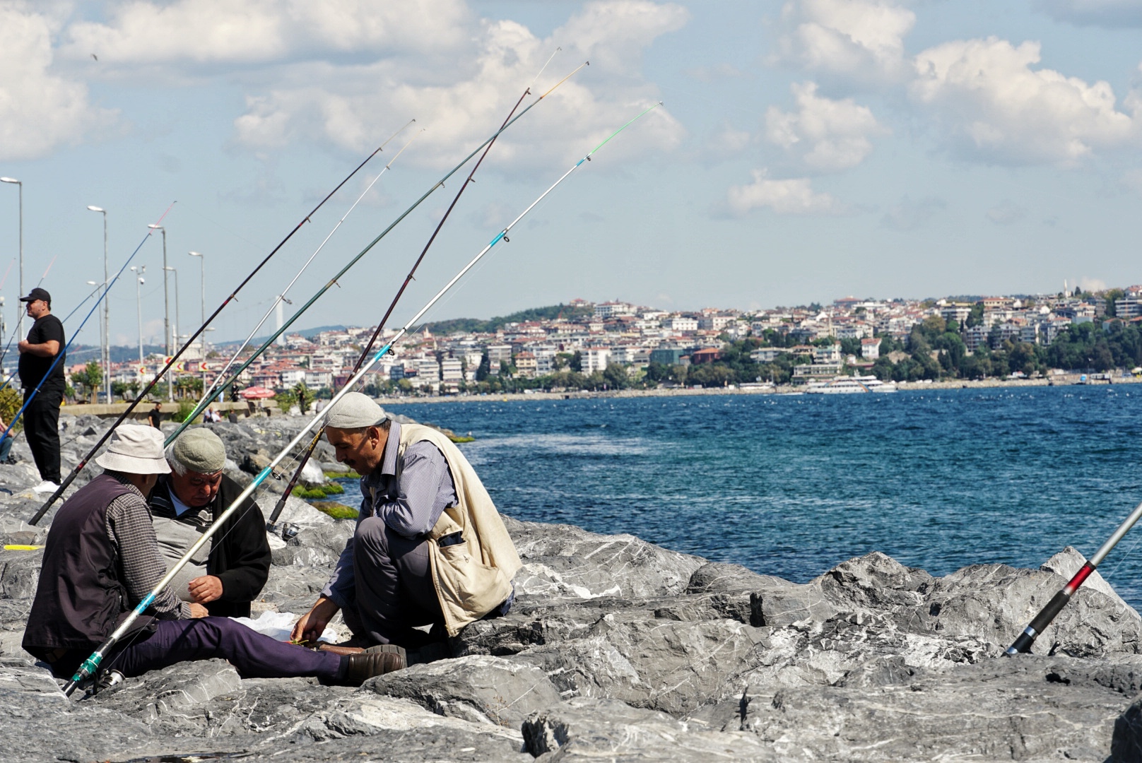Men eating lunch near Marmara Sea