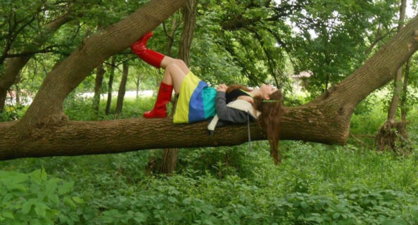 Portrait of girl in a tree